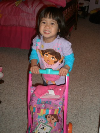 Karis and her Dora stroller